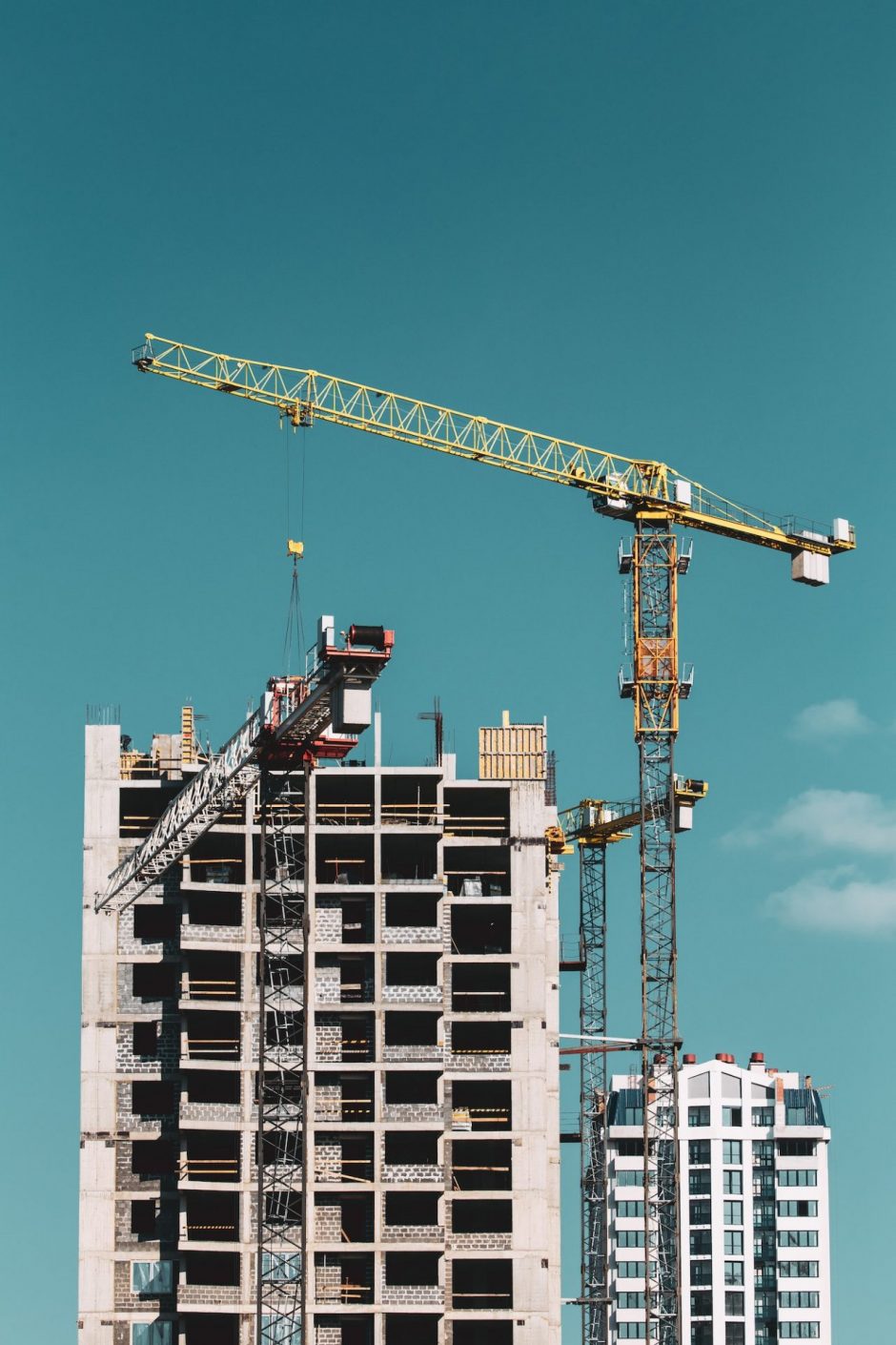 Construction Crane Is Involved In Construction Of A New Multi-st